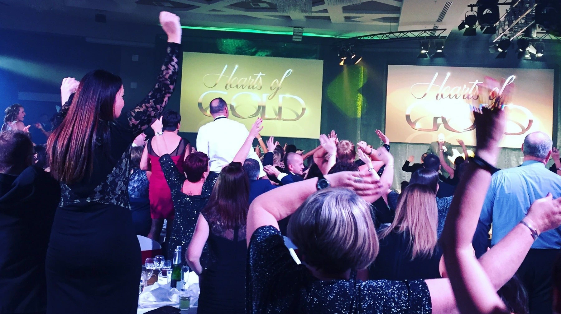 Guests celebrating at an annual awards evening